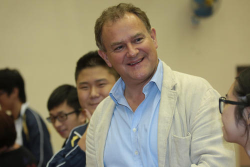 Hugh Bonneville visits the Cotton Spinner Association School